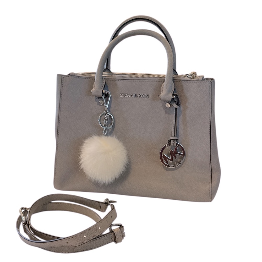 Like New Michael Kors Gray Satchel / Crossbody with faux fur charm included